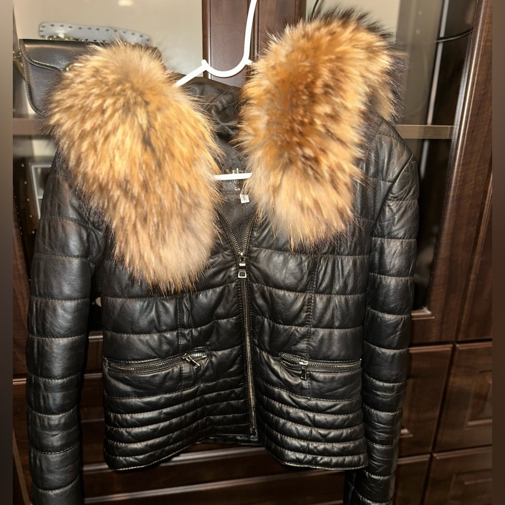 Elegant Black Leather Jacket with real Mink Fur! It’s size S and has pockets.